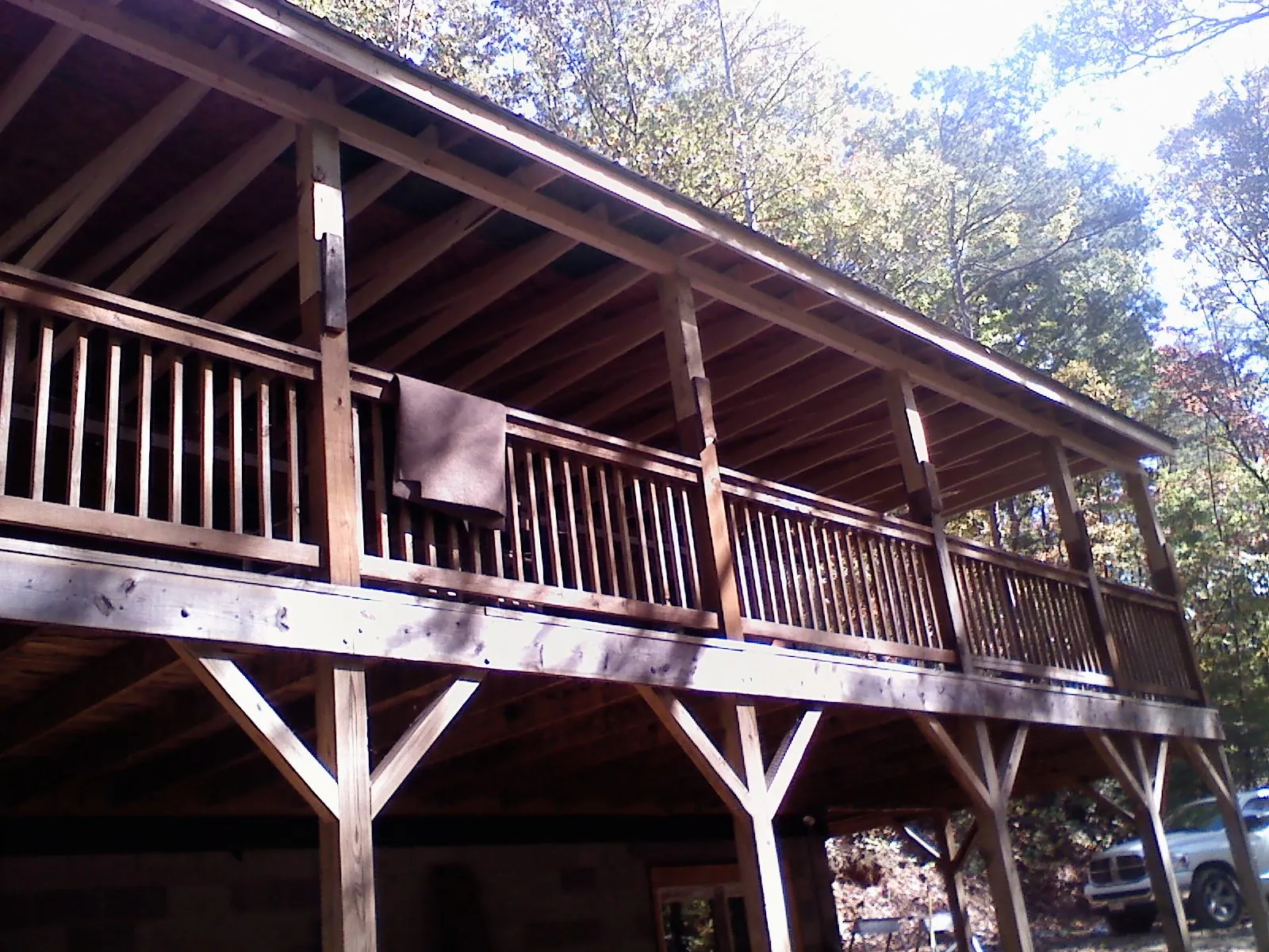 Timber framing under a new elevated porch and deck — Roof Leak Repair in Forestdale by Roofing Brothers